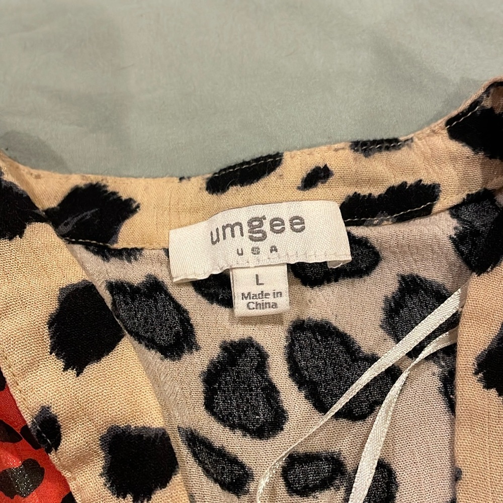 Sheer, colorful, leopard, print, breezy top.